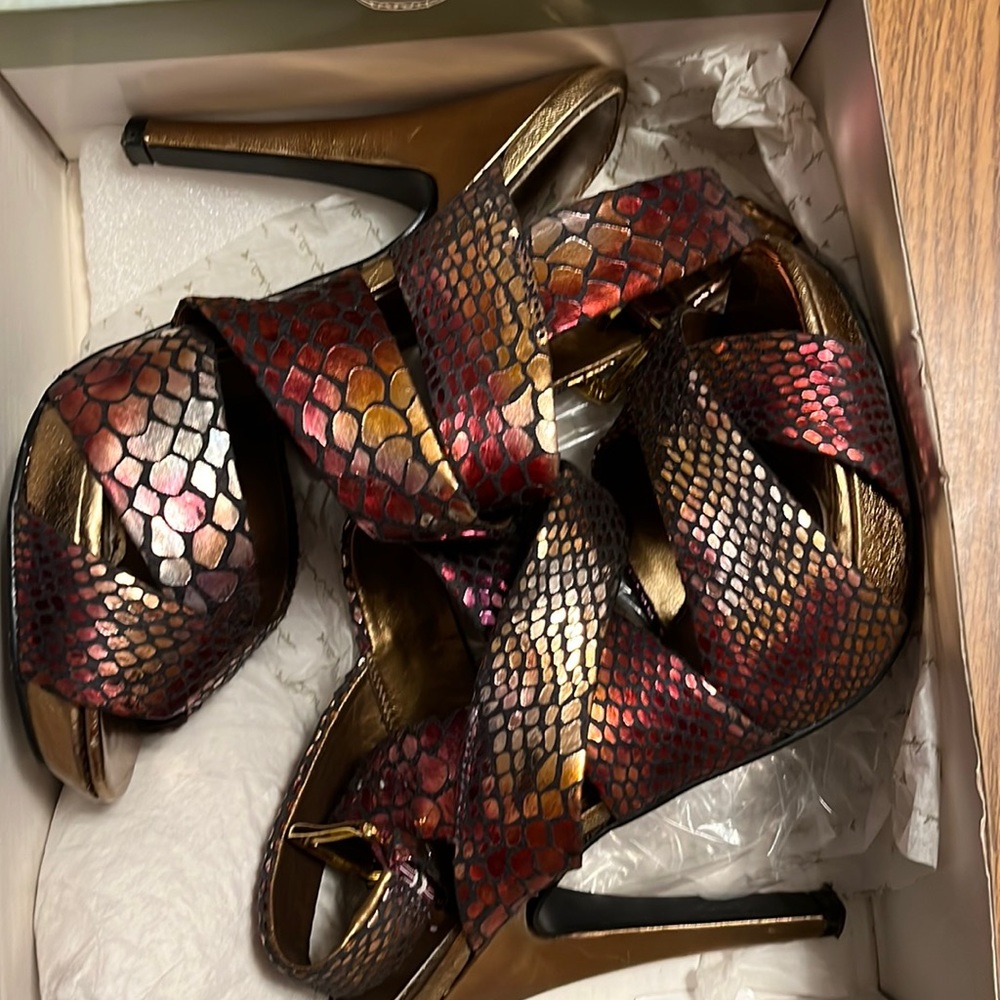My favorite heels❤️ multi colored snake print. Pics don’t do them justice